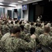 U.S. 5th Fleet Command Master Chief Russell Mason hosts an all hands call for service members stationed at Naval Support Activity Bahrain