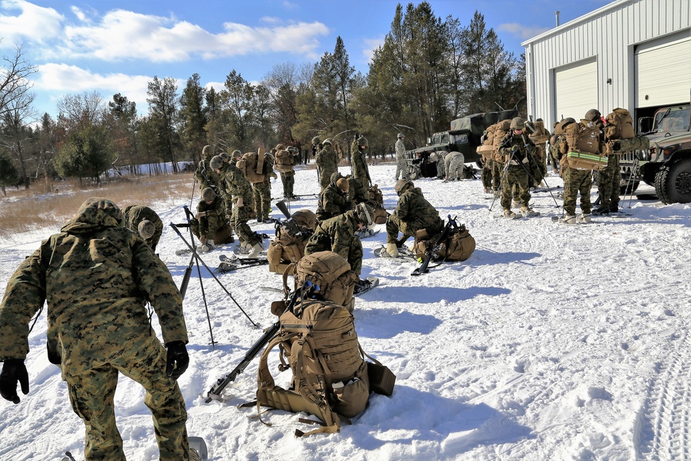 Cold-Weather Operations Course students prepare for snowshoe training