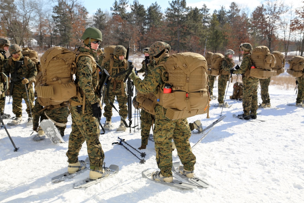 Cold-Weather Operations Course students prepare for snowshoe training