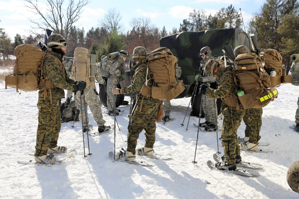 Cold-Weather Operations Course students prepare for snowshoe training