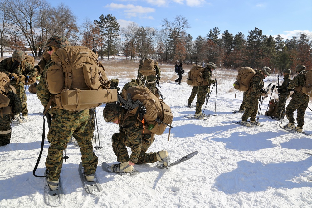 Cold-Weather Operations Course students prepare for snowshoe training