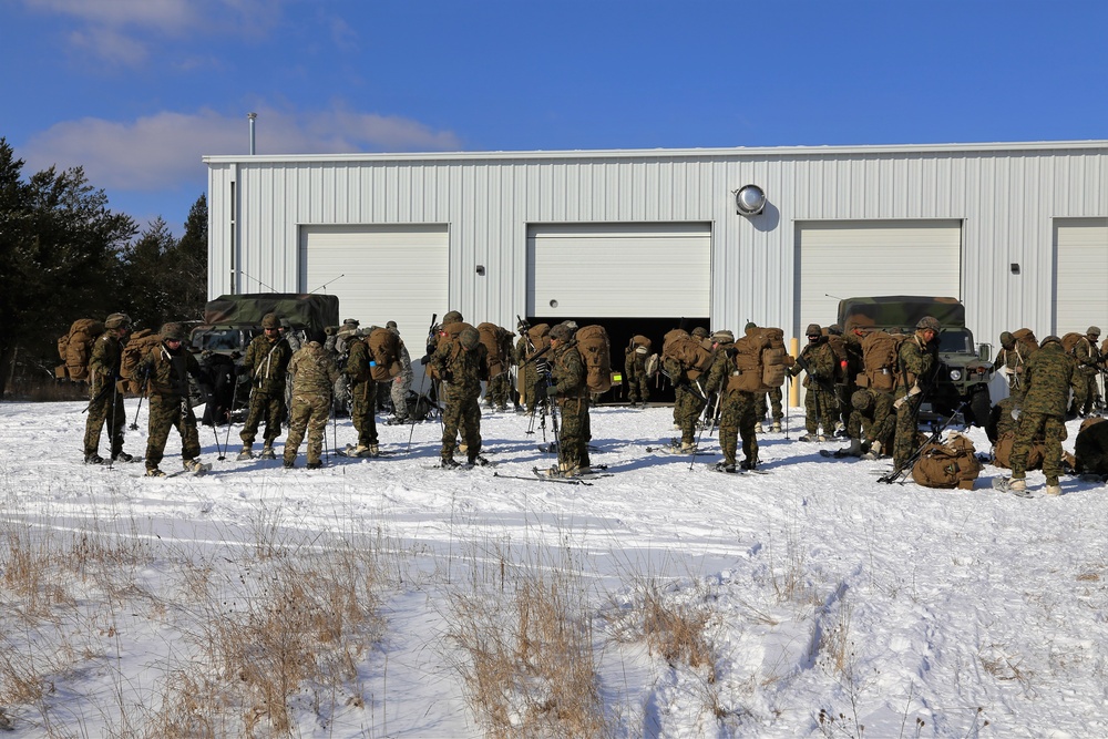 Cold-Weather Operations Course students prepare for snowshoe training