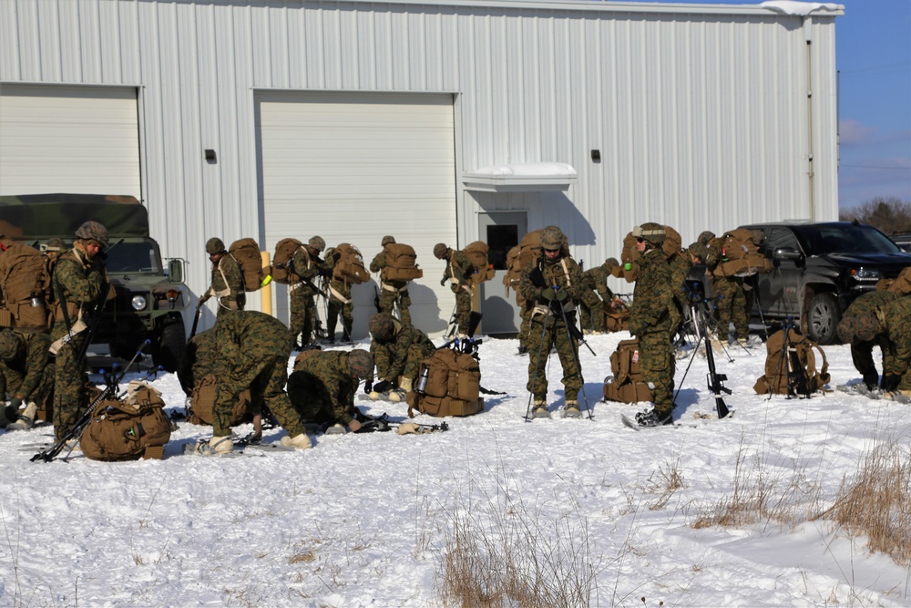 Cold-Weather Operations Course students prepare for snowshoe training