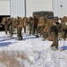Cold-Weather Operations Course students prepare for snowshoe training