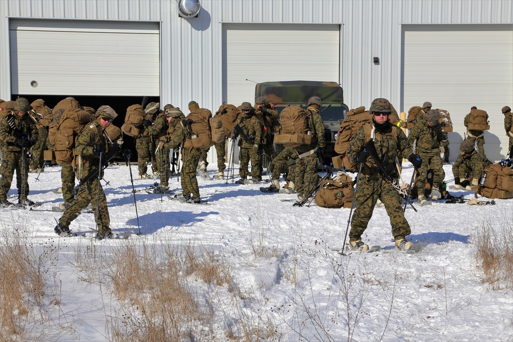 Cold-Weather Operations Course students prepare for snowshoe training