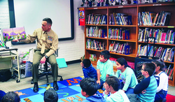 Commander teaches elementary students what makes them different makes them special