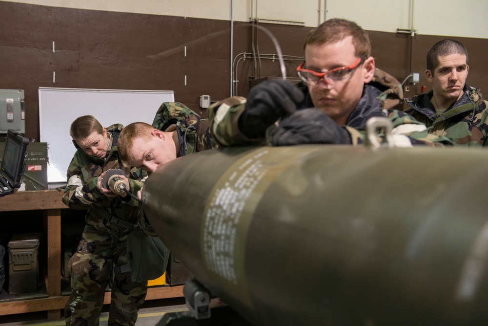 477th Maintenance Squadron Airmen practice bomb building in a simulated toxic environment