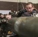 477th Maintenance Squadron Airmen practice bomb building in a simulated toxic environment