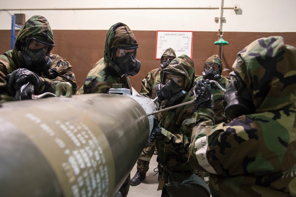 477th Maintenance Squadron Airmen practice bomb building in a simulated toxic environment