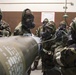 477th Maintenance Squadron Airmen practice bomb building in a simulated toxic environment