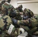 477th Maintenance Squadron Airmen practice bomb building in a simulated toxic environment