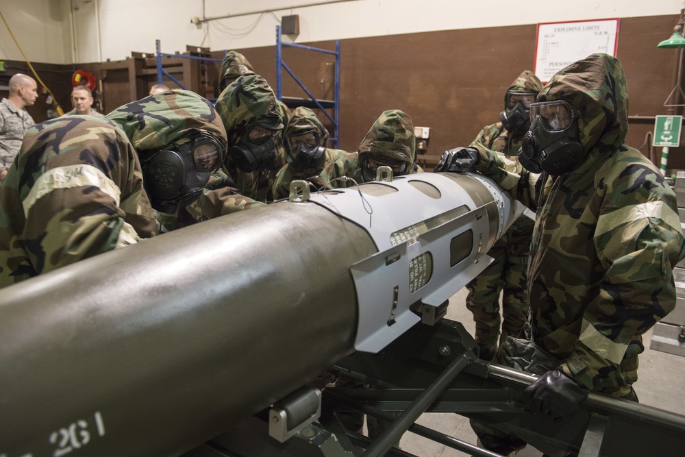 477th Maintenance Squadron Airmen practice bomb building in a simulated toxic environment