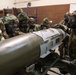 477th Maintenance Squadron Airmen practice bomb building in a simulated toxic environment