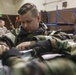 477th Maintenance Squadron Airmen practice bomb building in a simulated toxic environment