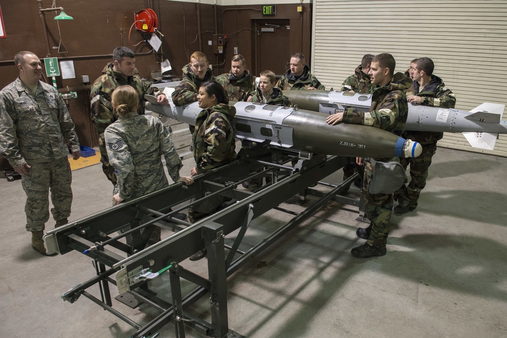 477th Maintenance Squadron Airmen practice bomb building in a simulated toxic environment