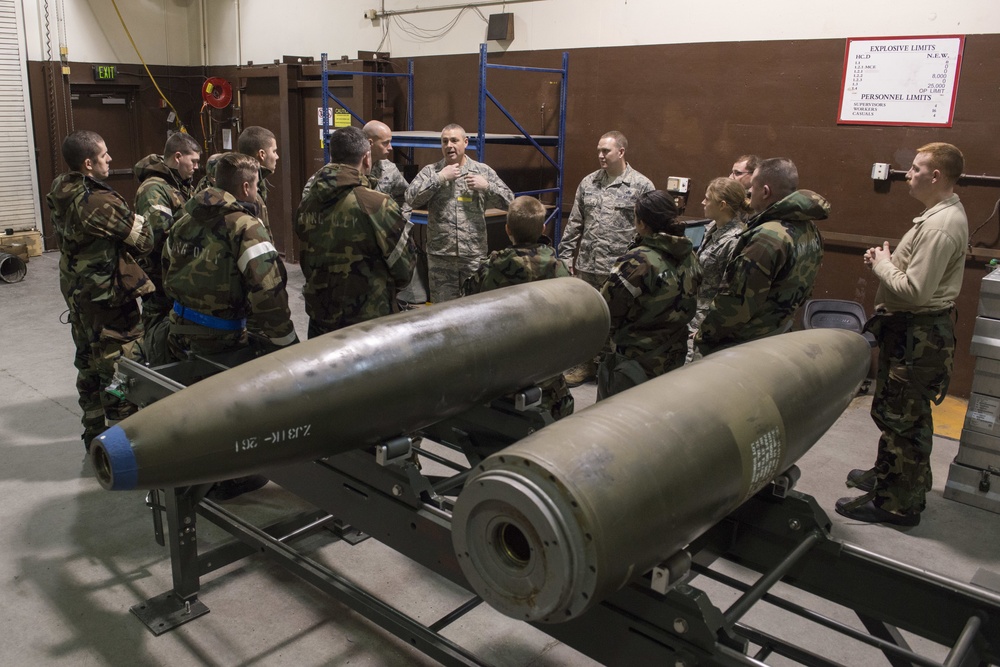 477th Maintenance Squadron Airmen practice bomb building in a simulated toxic environment