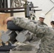 3rd Munitions Squadron Airmen practice handling small diameter bombs