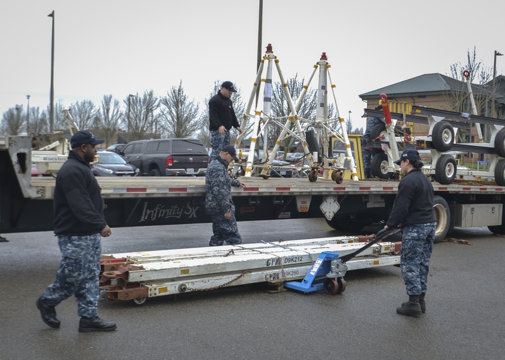 Nimitz Sailors Unload Truck