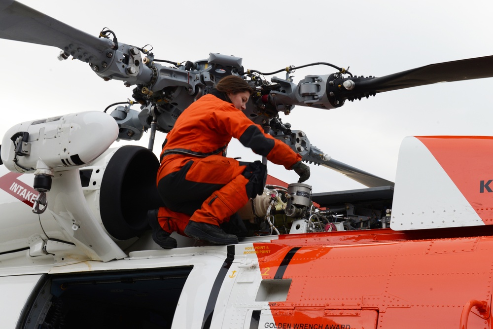 AMT2 Best performs post-flight checks on MH-60 Jayhawk helicopter
