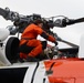 AMT2 Best performs post-flight checks on MH-60 Jayhawk helicopter