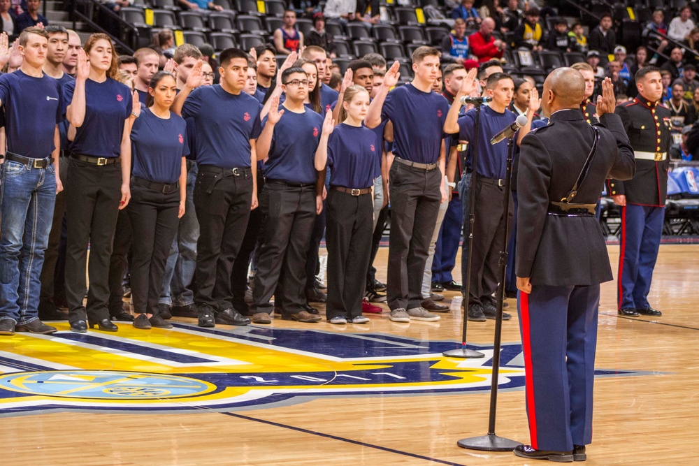 Local future Marines take oath of enlistment in Denver Pepsi Center