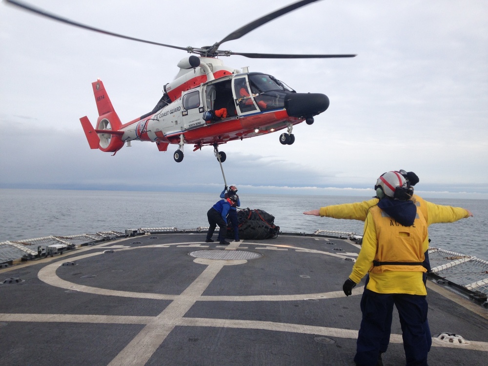 Coast Guard Cutter Active crewmembers conduct vertical replenishment exercise