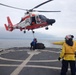 Coast Guard Cutter Active crewmembers conduct vertical replenishment exercise