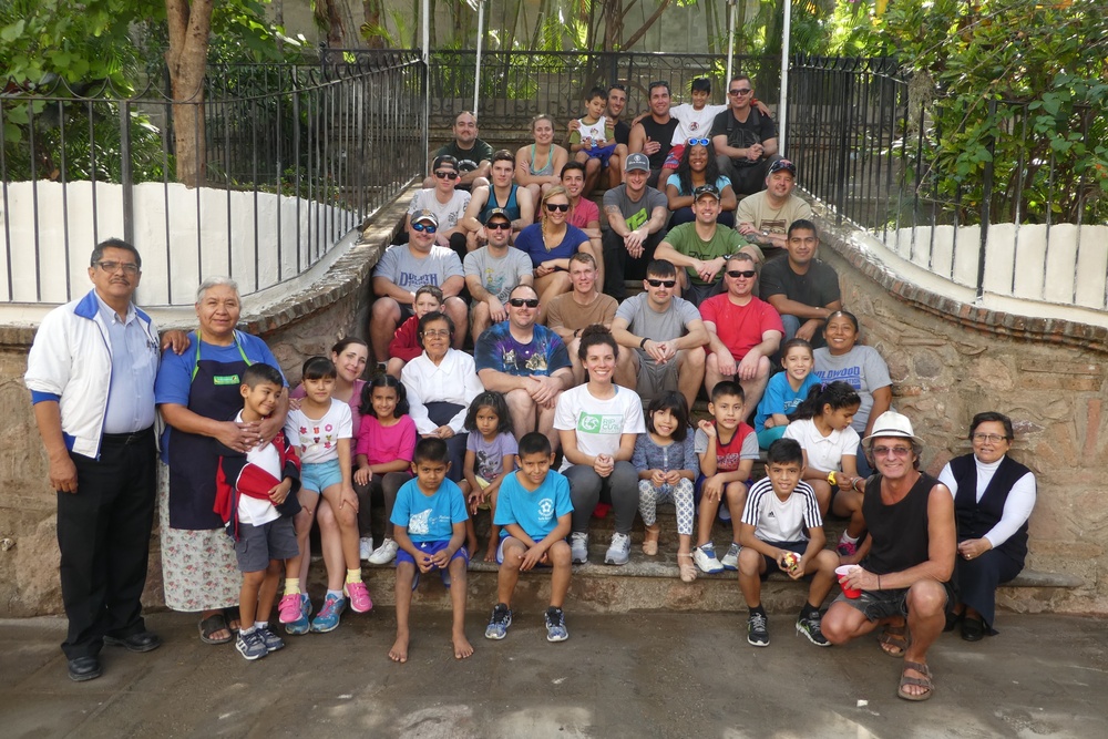 Coast Guard Cutter Active crewmembers volunteer at a children’s home during port call in Mexico