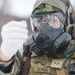 Explosives Ordinance Disposal Airmen conduct live-fire range in simulated chemical environment