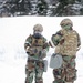 Explosives Ordinance Disposal Airmen conduct live-fire range in simulated chemical environment