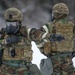 Explosives Ordinance Disposal Airmen conduct live-fire range in simulated chemical environment