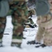 Explosives Ordinance Disposal Airmen conduct live-fire range in simulated chemical environment