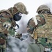 Explosives Ordinance Disposal Airmen conduct live-fire range in simulated chemical environment