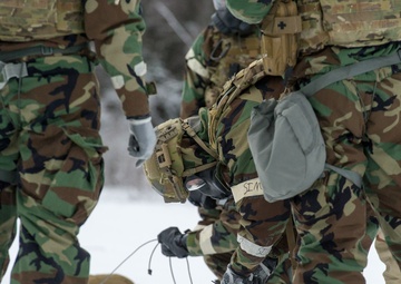 Explosives Ordinance Disposal Airmen conduct live-fire range in simulated chemical environment