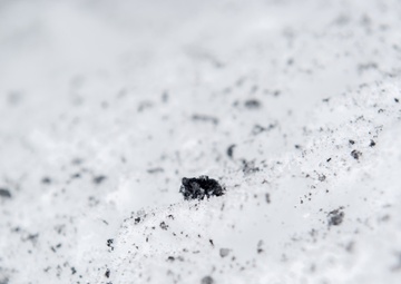 Explosives Ordinance Disposal Airmen conduct live-fire range in simulated chemical environment