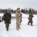 Explosives Ordinance Disposal Airmen conduct live-fire range in simulated chemical environment