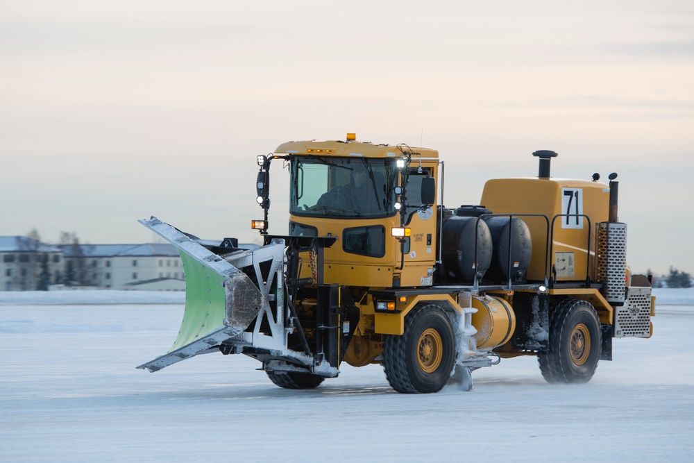 773rd Civil Engineer Squadron clear the JBER flight line