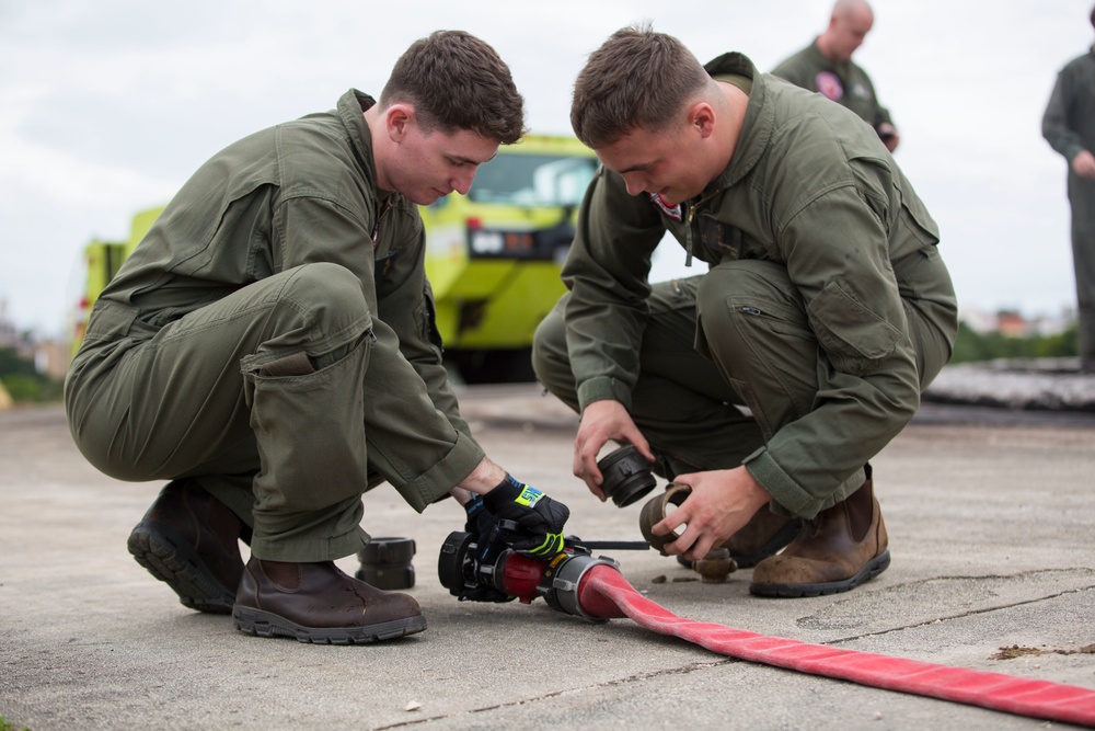 Aircraft Rescue Firefighting Marines conduct Wet Run