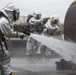 Aircraft Rescue Firefighting Marines conduct Wet Run