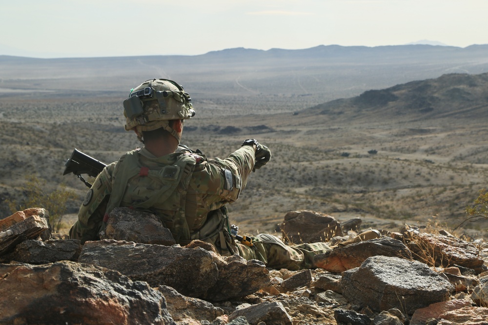 Soldier scans for simulated enemies at a observation post