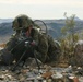 Soldier scans for simulated enemies at a observation post
