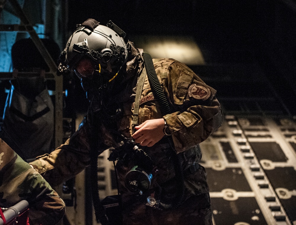 Aircrew conduct in-flight training with protective gear
