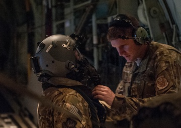Aircrew conduct in-flight training with protective gear