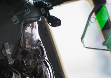 Aircrew conduct in-flight training with protective gear