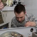 Airman Flushes Equipment Sterilization Unit Hoses