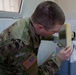 Soldier Troubleshoots Chemsitry Lab Analyzer