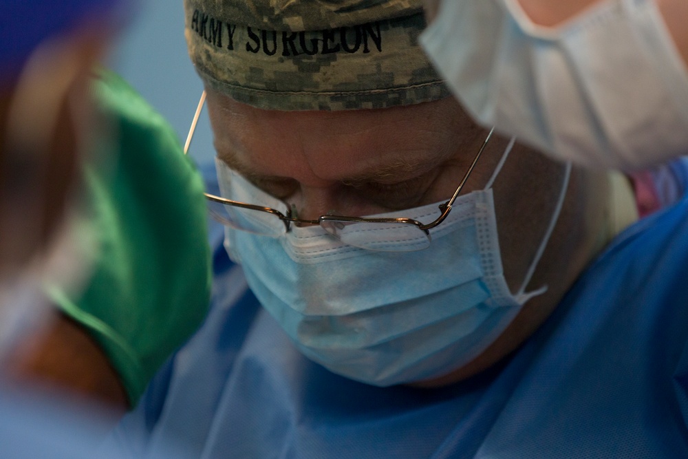 Vermont National Guard Surgeon Aids in Tumor Removal