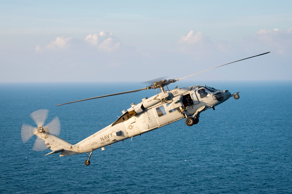 MH-60S Sea Hawk assinged to Bonhomme Richard (LHD 6) fires unguided rocket during live fire exercise