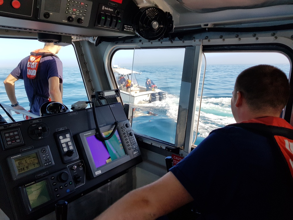 Coast Guard helps 2 men to safety after their boat hit an object off North Carolina coast
