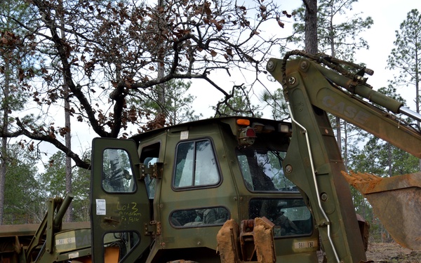 Engineers dig troop trenches for defense at JRTC